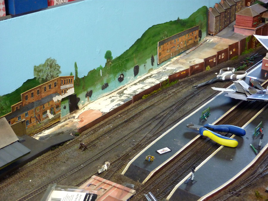 With a photo-shoot of the layout coming up in almost no time at all, a chisel was taken to the old buildings...
