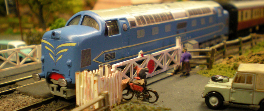 Class prototype Deltic pauses at the level crossing to allow its adoring public to get a closer look. Although Deltic is not normally a West Country visitor, this trip was a rail tour special.